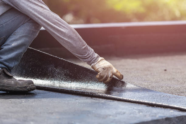 Professional Basement Waterproofing technician working in Unionville, GA
